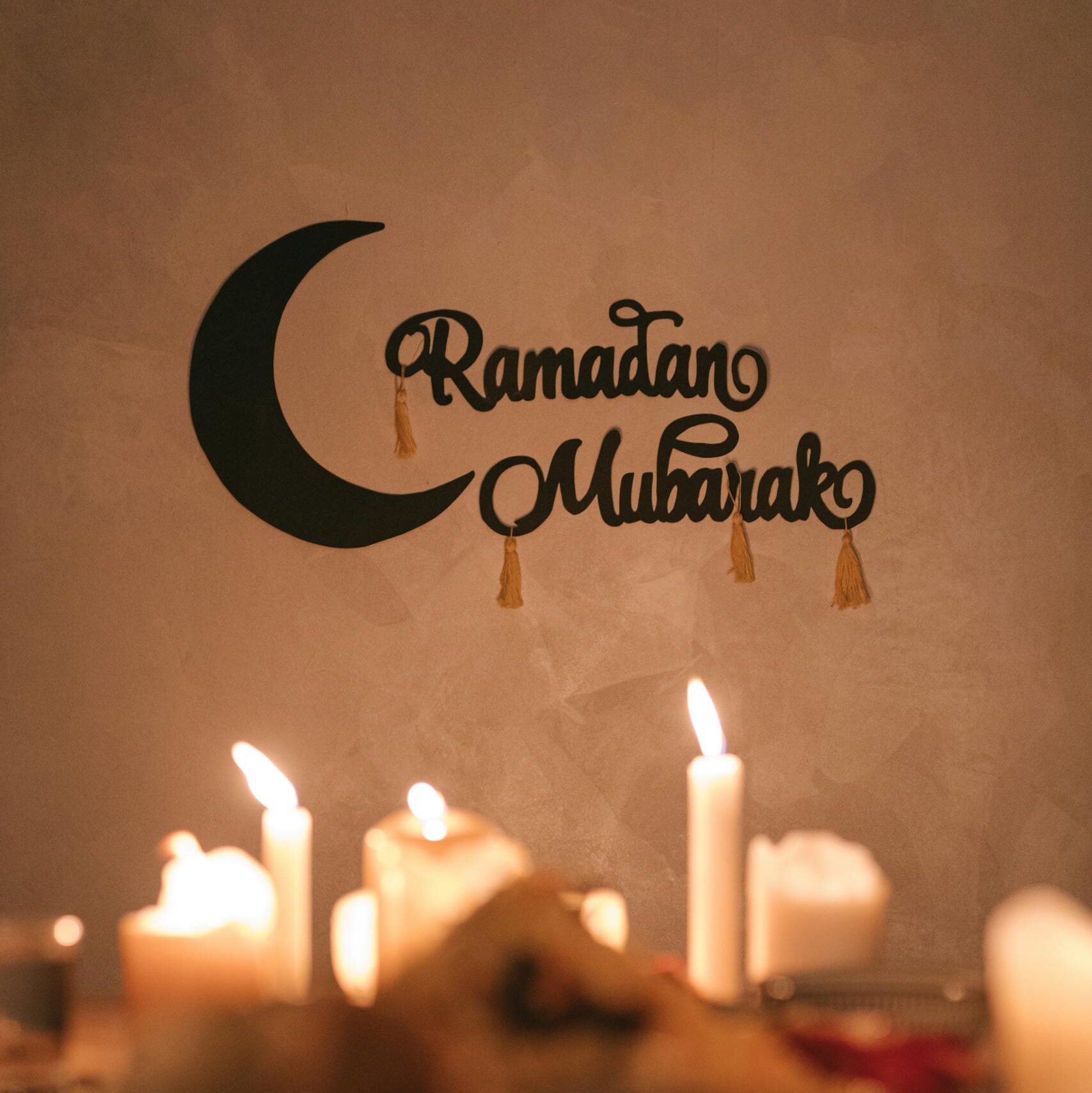 A serene Ramadan Mubarak decoration with glowing candles, perfect for festive ambiance.